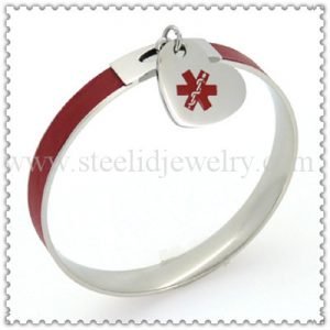 Kermesinus enamel bangle with medical ID heart charm